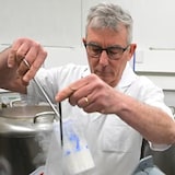 A technician prepares vials containing sperm frozen in liquid nitrogen. Health Canada is replacing sperm donor screening questions about men who have sex with men in the previous three months with gender-neutral questions. 