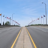 Flags on the Bridge of Nations in Sudbury signify the presence of immigrants to the city from those countries. 