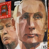 T-shirts with images of Vladimir Putin and Donald Trump at a gift shop.