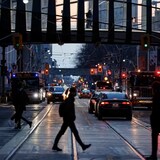 Pedestrians are shown during the evening commute in Toronto in February 2022. Hybrid immunity from vaccination and prior infection is holding up against hospitalizations and deaths and will likely continue to help control the severity of COVID in Canada and around the world for the foreseeable future. (Evan Mitsui/CBC)