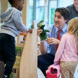 Prime Minister Justin Trudeau speaks with kids at the Stationview YMCA Childcare Centre in St. Thomas, Ont., on May 13, 2024.