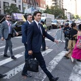 Prime Minister Justin Trudeau walks through the streets of New York, where he addressed the United Nations on Wednesday to outline the country's emissions-reduction plans. (Adrian Wyld/The Canadian Press)