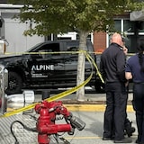 First responders are pictured outside Tsawwassen Mills on Wednesday. Police say the investigation into a crash that killed 2 people, and injured 2 others, continues on Thursday.
