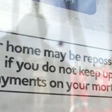 Canadian households now owe more money as a percentage of the total economy than those in most developed nations, and mortgage debt is the biggest reason why, a new report Canada Mortgage and Housing Corporation (CMHC) says. (Simon Dawson/Bloomberg)