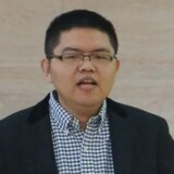 Yuesheng Wang faces four charges under the Security of Information Act and the Criminal Code of Canada. (Yuesheng Wang/LinkedIn)