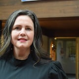 A headshot of a woman.