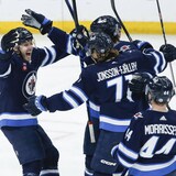 Winnipeg Jets winger Kyle Connor celebrates his winning goal against the Arizona Coyotes on Sunday. The Jets are having one of the strongest seasons ever this year, on the ice. Average attendance, however, is the lowest for Winnipeg since the NHL returned to the city, not counting seasons in which pandemic restrictions were in place.