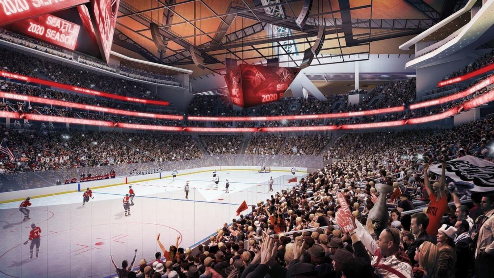 Des spectateurs assistent à une partie de hockey dans le futur aréna de Seattle.