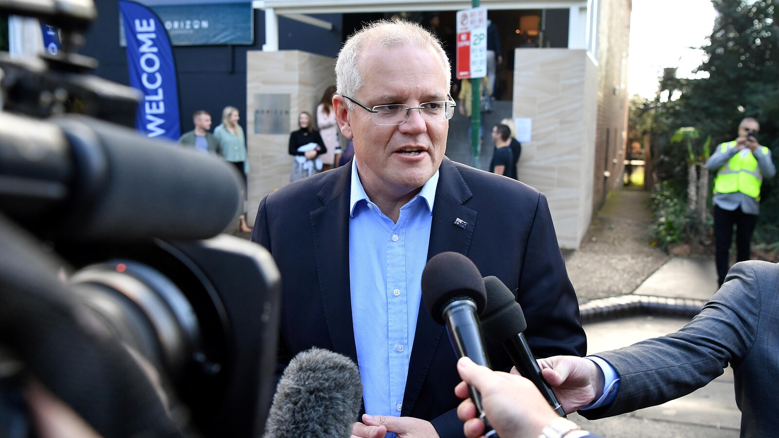 Le premier ministre sortant (et réélu) de l'Australie, Scott Morrison, s'adressant aux médias.