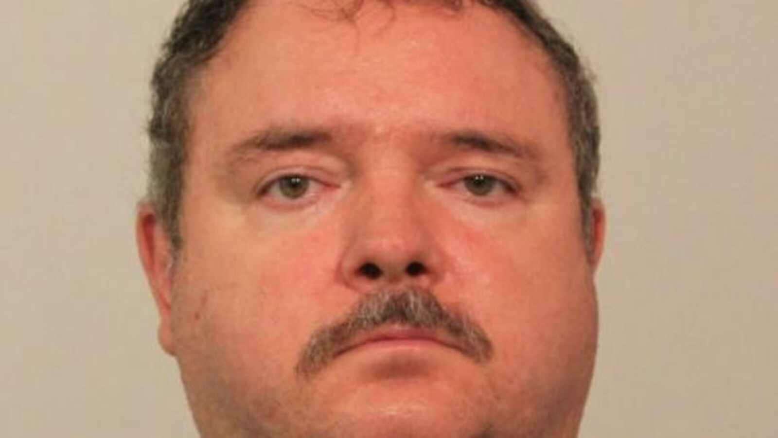 Une photo d'identité judiciaire montre le suspect Daniel Laframboise.
