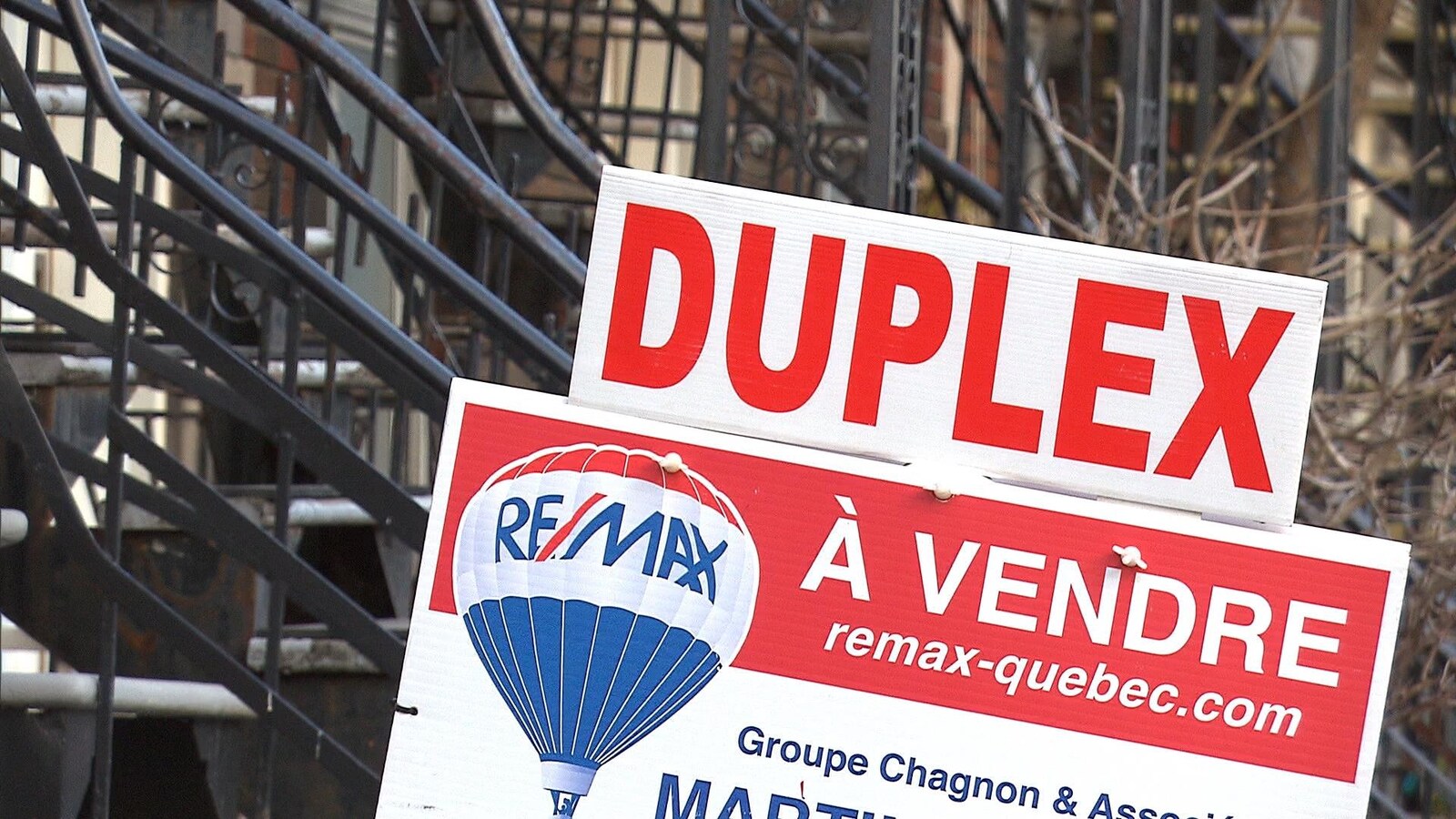 Pancarte « Duplex à vendre »