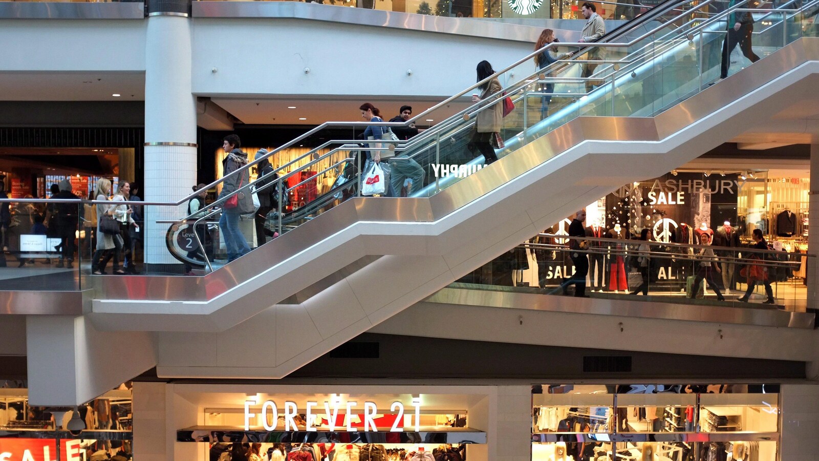 Shoppers mill through Toronto's Eaton Centre shopping centre on the last day before Christmas, Thursday, Dec. 24, 2015. THE CANADIAN PRESS/Peter Cameron