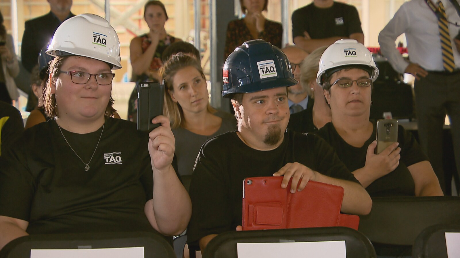 Des employés du Groupe TAQ