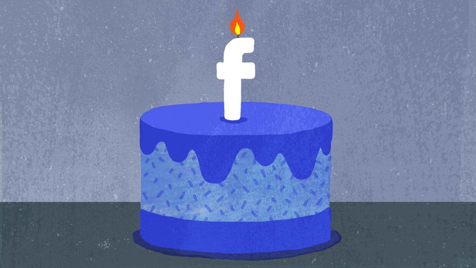 Un gâteau d'anniversaire surmonté d'une chandelle en forme du logo du réseau social Facebook.