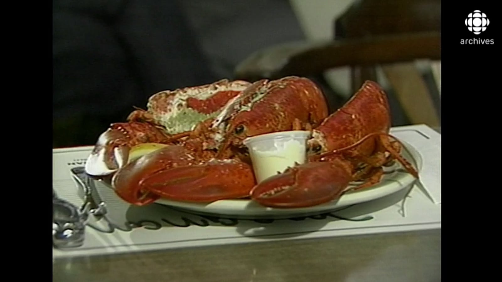 presentation d un homard sur assiette