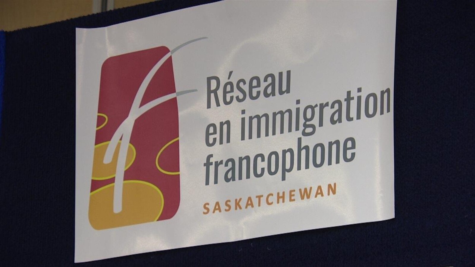 Logo du Réseau en immigration francophone de la Saskatchewan