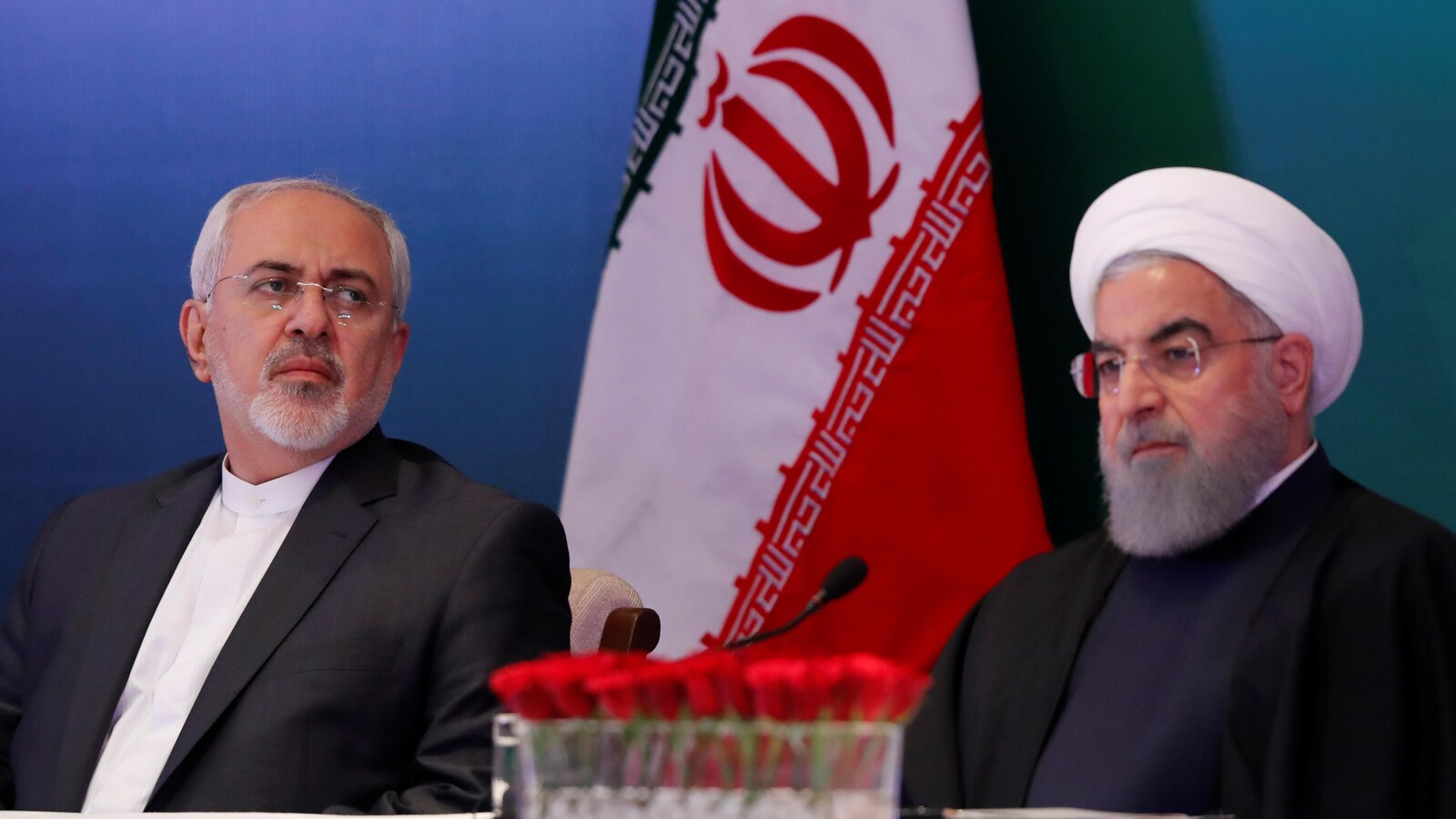 Le ministre iranien des Affaires étrangères et le président de l'Iran lors d'une rencontre.
