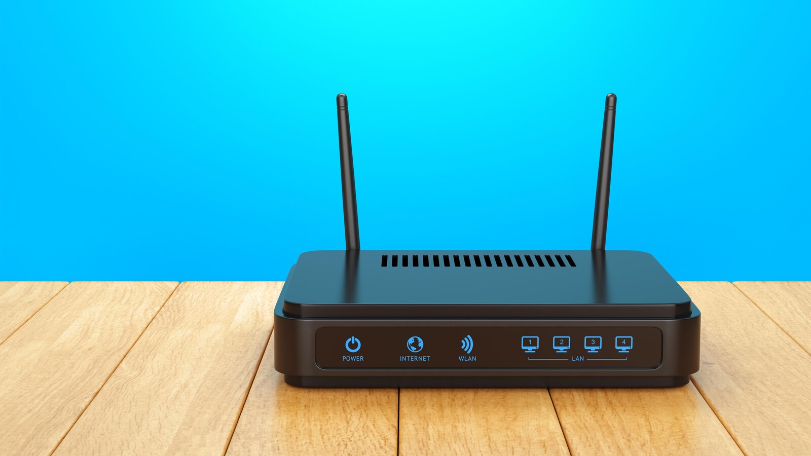 Routeur sans fil avec deux antennes sur une table en bois.