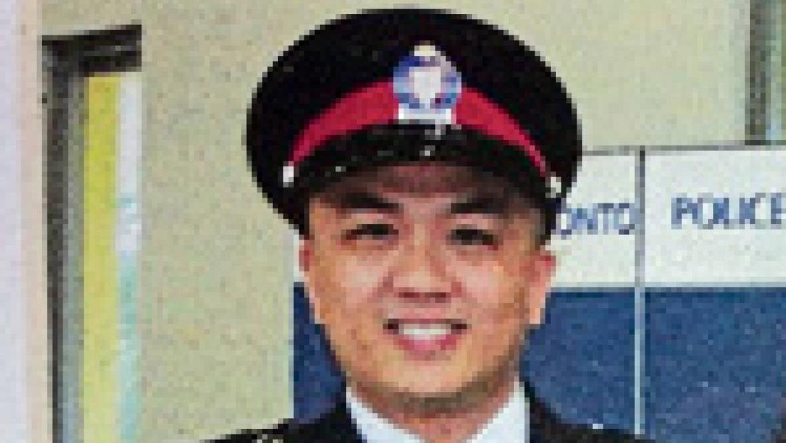 Portrait de l'agent Ken Lam.