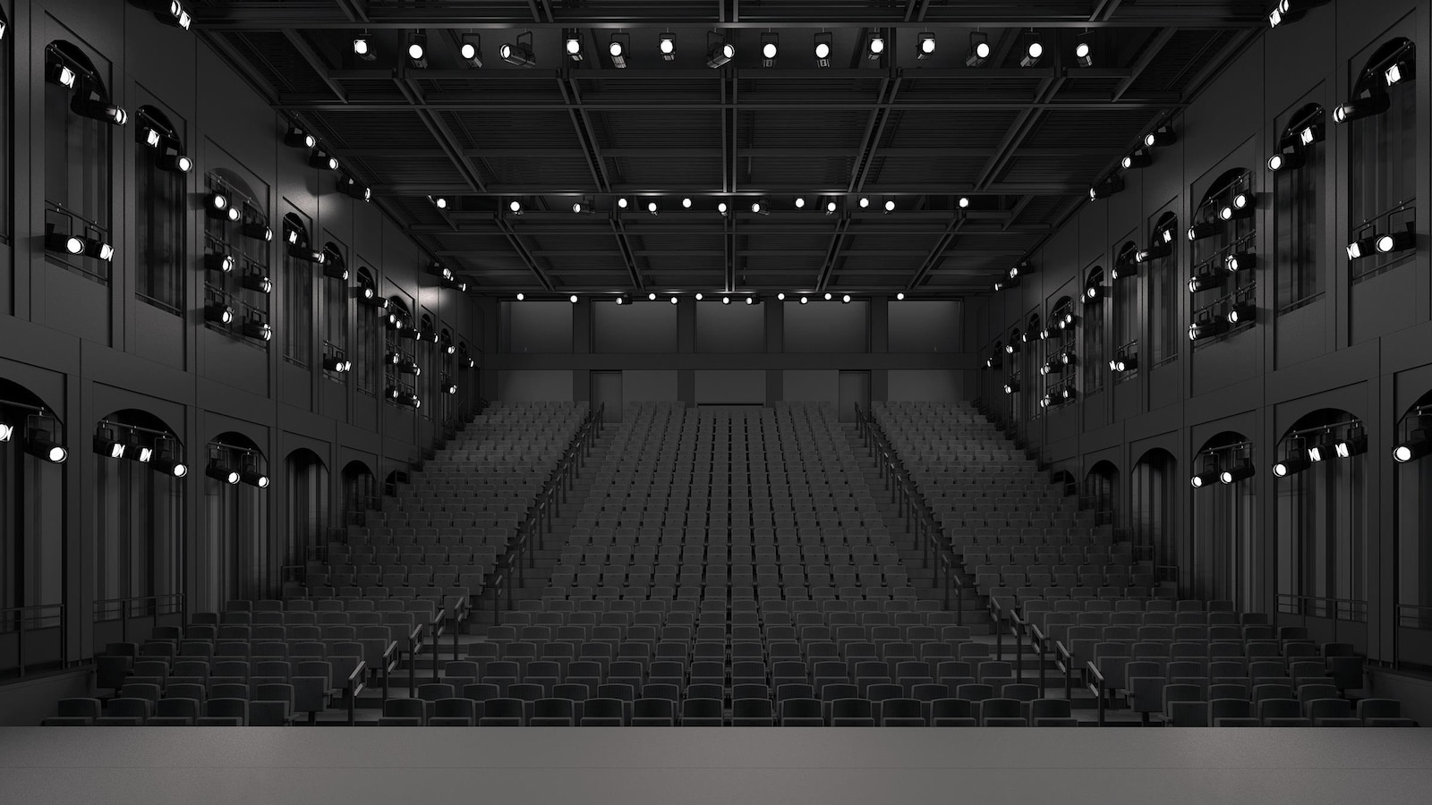 Une maquette de salle de spectacle avec des sièges noirs.