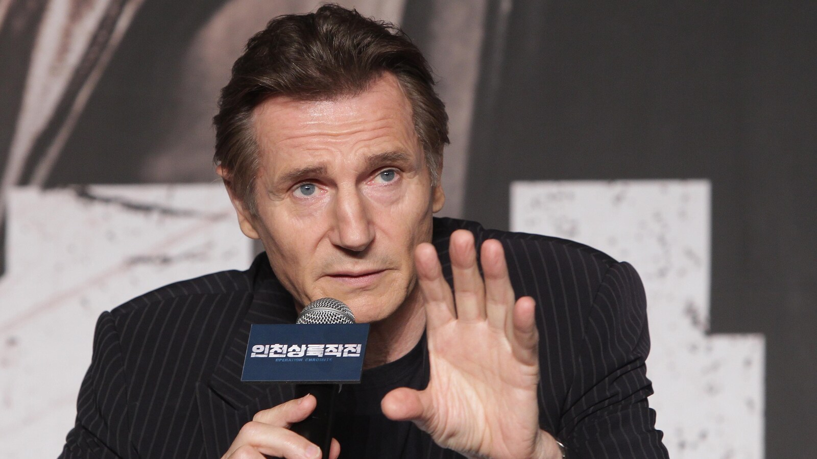L'acteur Liam Neeson parle lors d'une conférence de presse pour faire la promotion d'un film à Séoul, en Corée du Sud, le 13 juillet 2016.