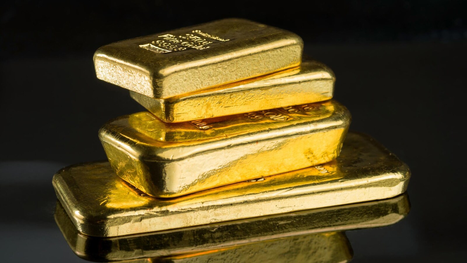 Des lingots d'or de différents poids.