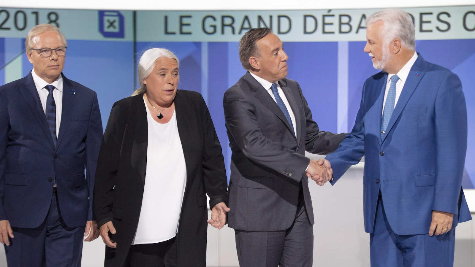 Le chef du Parti québécois Jean-François Lisée, la co-porte-parole de Québec solidaire, Manon Massé, le chef de la Coalition avenir Québec, François Legault, et le chef du Parti libéral du Québec, Philippe Couillard