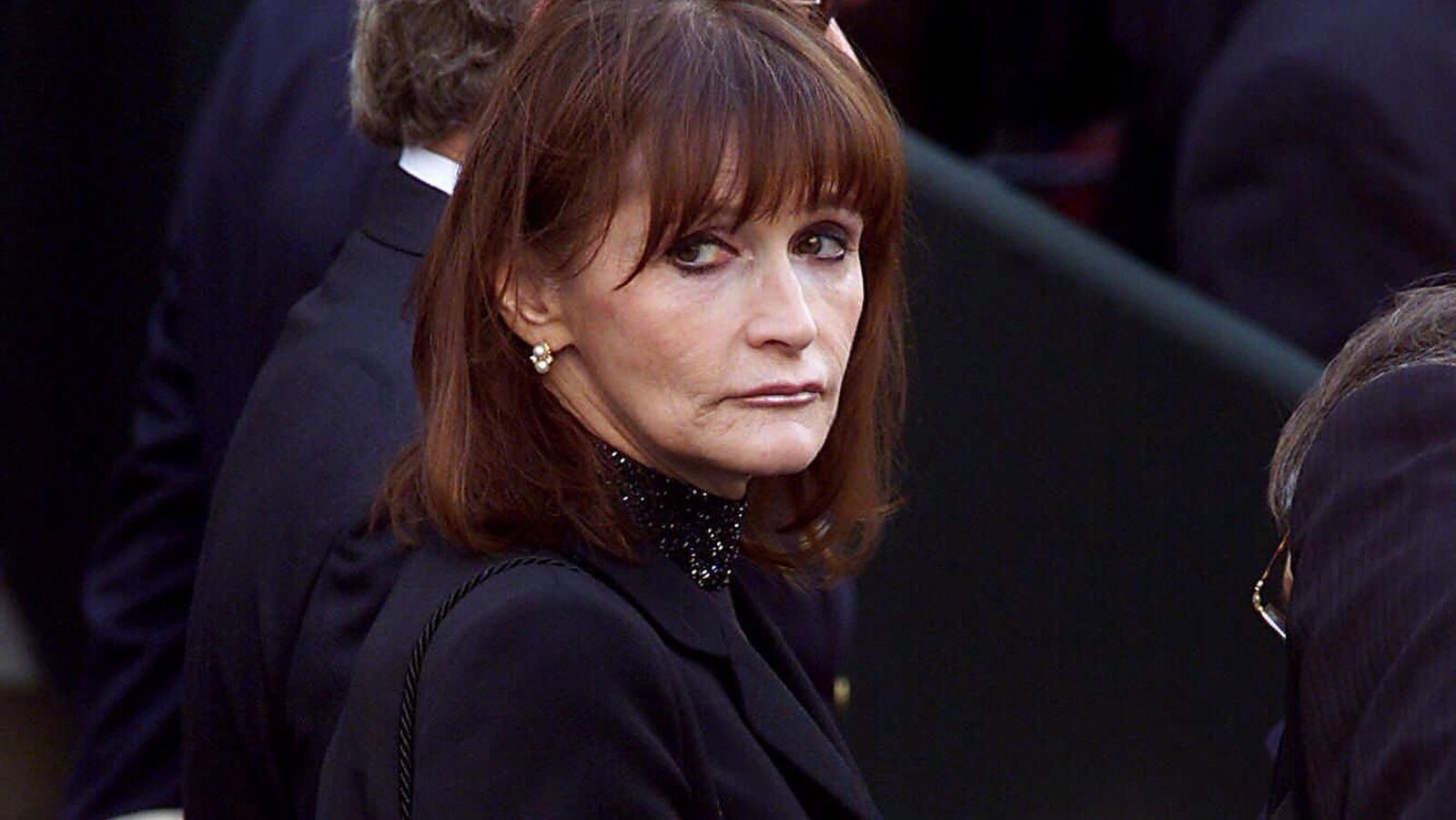 Portrait de Margot Kidder, qui a l'air triste.