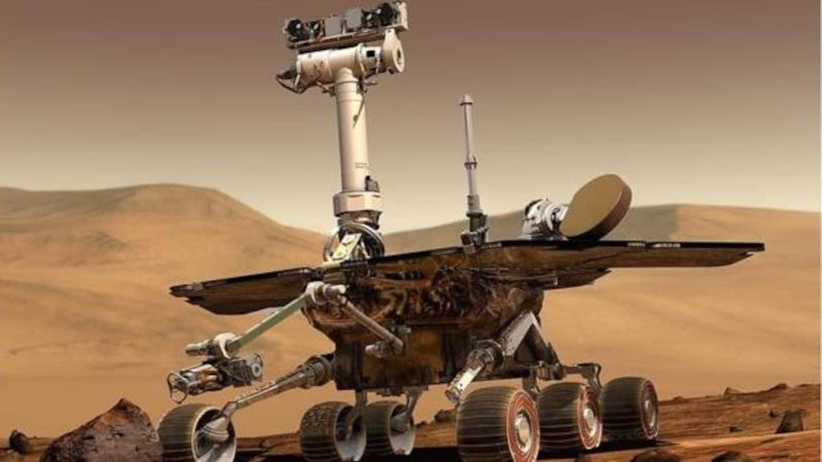 Représentation artistique du robot Opportunity lors de son arrivée à la surface de Mars en 2004.