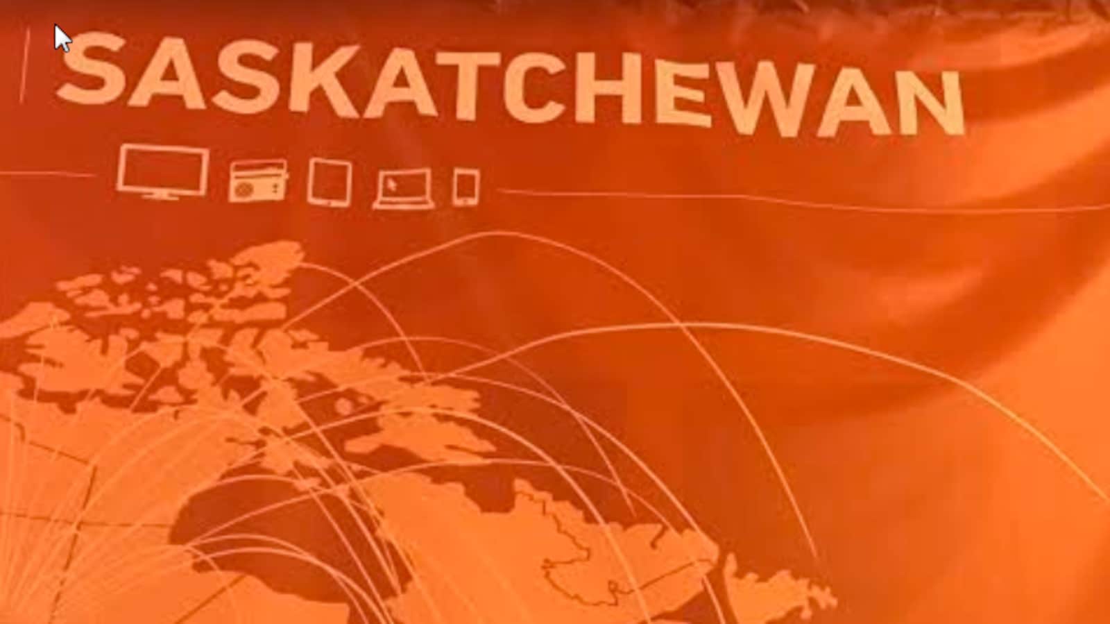 Une Banderole orange avec le mot Saskatchewan et des motifs d'une carte du Canada.