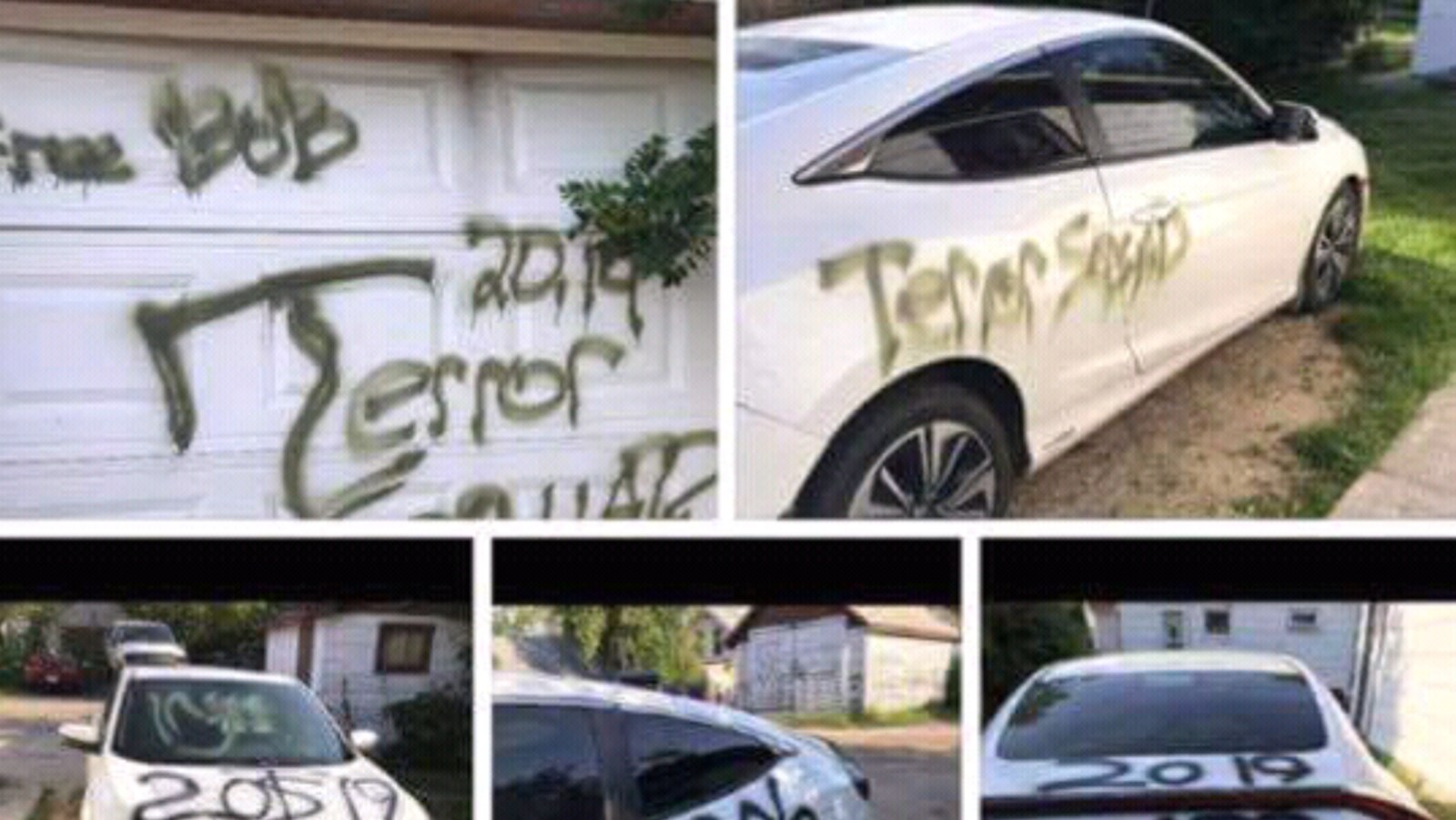 Des graffitis noirs sur une voiture blanche.