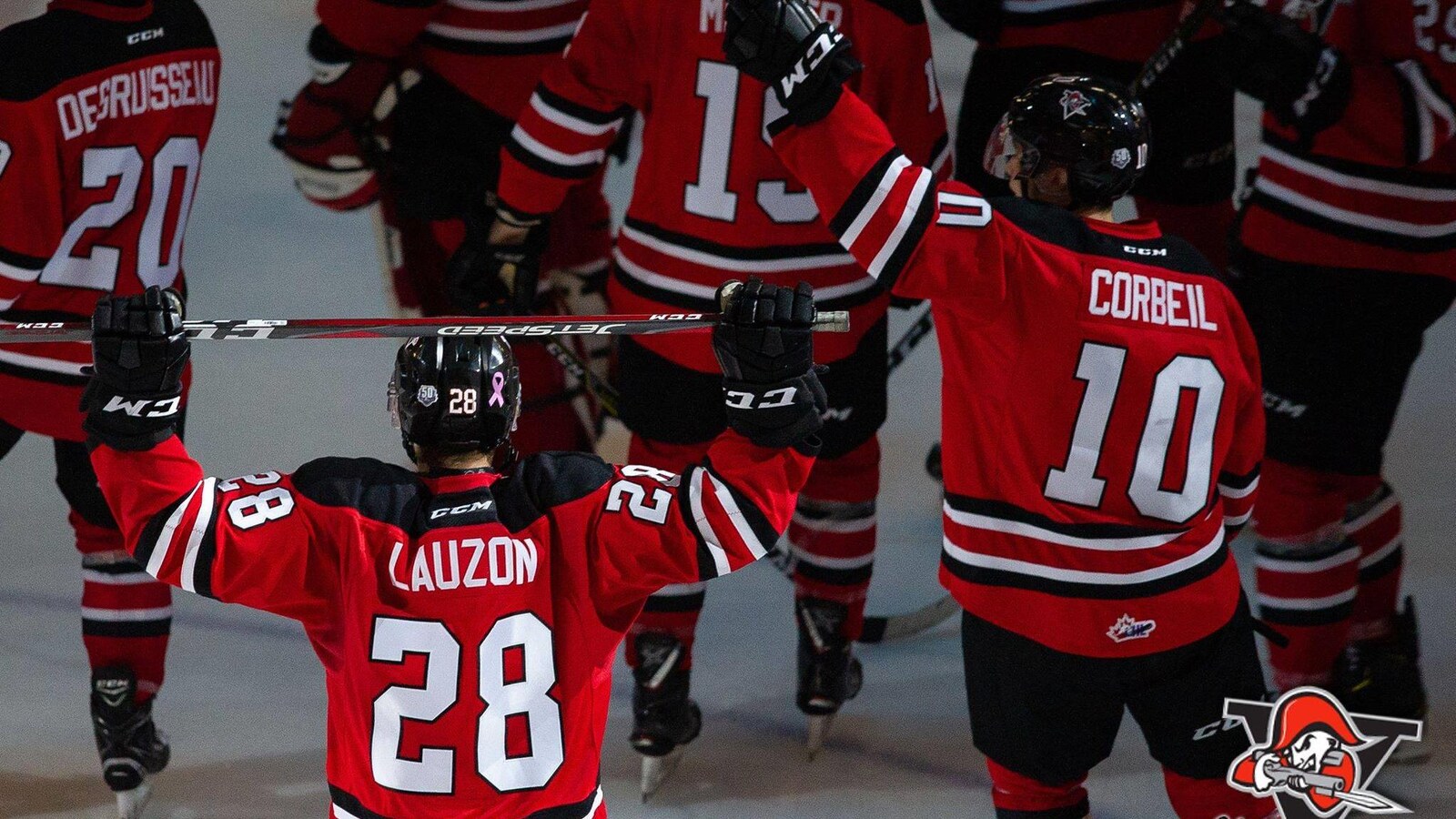 Des joueurs des voltigeurs heureux