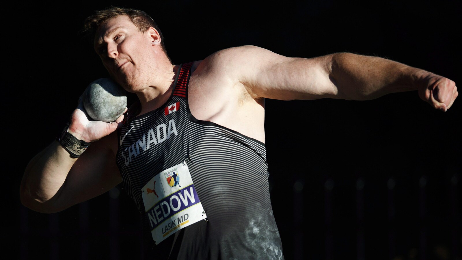 Tim Nedow participe à l'épreuve du lancer du poids aux Championnats d'Amérique du Nord, d'Amérique centrale et des Caraïbes d'athlétisme.