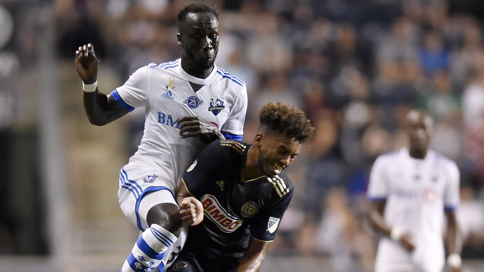 Bacary Sagna (à gauche) et Auston Trusty de l'Union entrent en collision lors du match du 15 septembre 2018 à Chester en Pensylvannie.