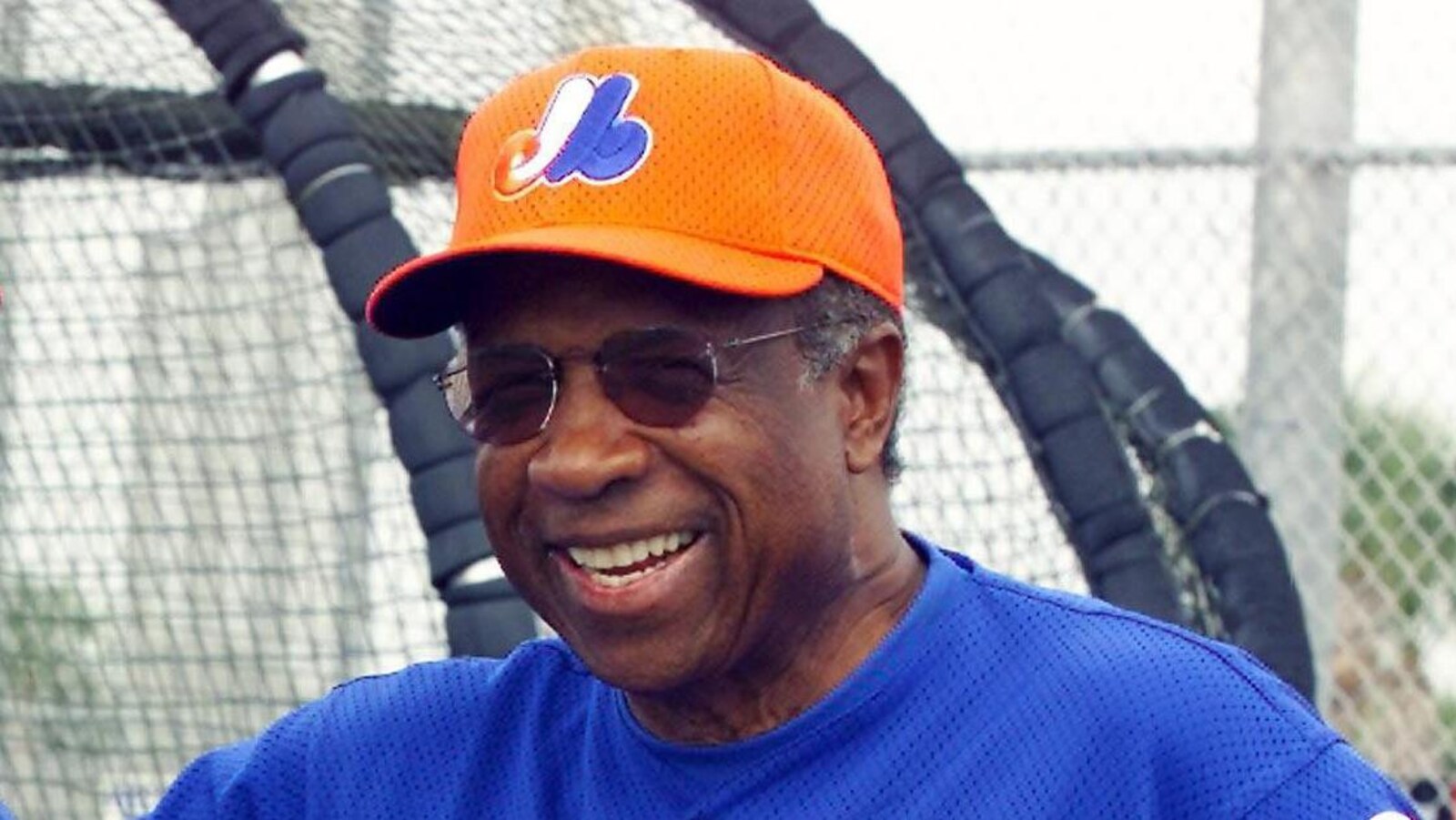 Frank Robinson sourit lors d'un entraînement des Expos à Jupiter, en Floride.