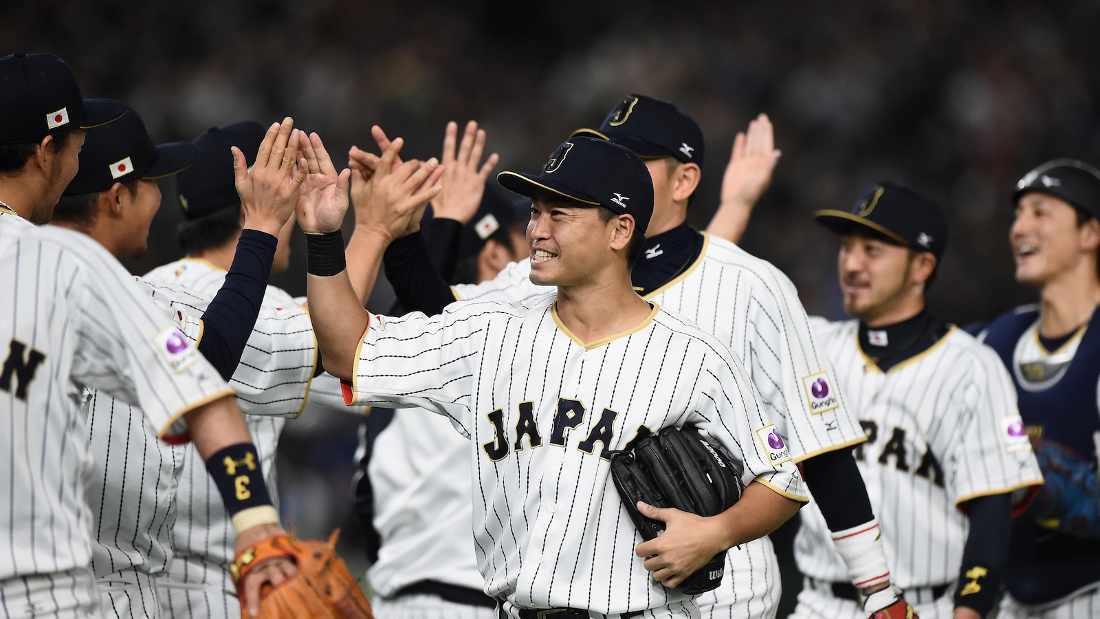 Les Japonais célèbrent leur victoire.