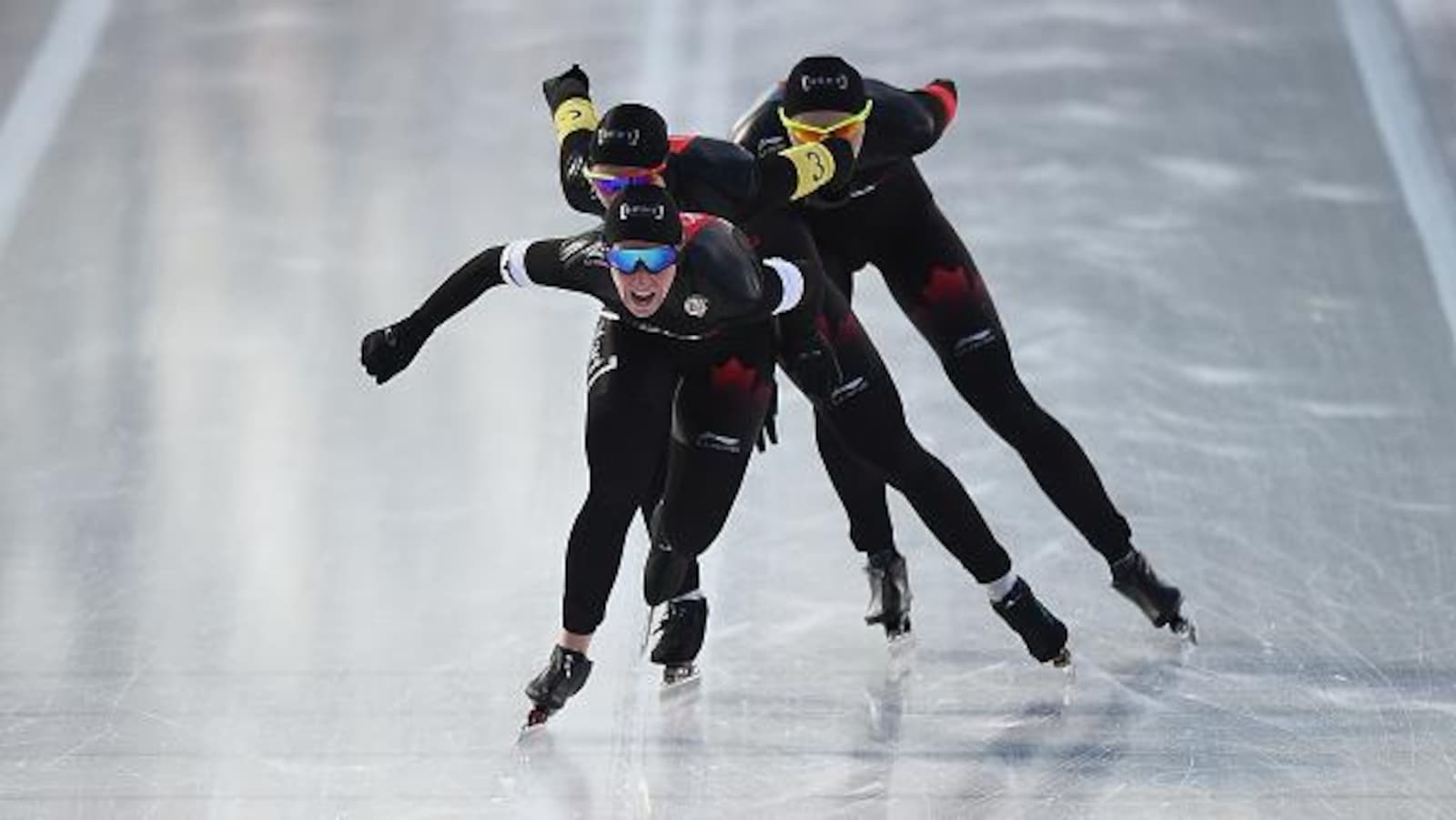 Ivanie Blondin, Isabelle Weidemann et Keri Morrison à l'arrivée de la poursuite par équipe