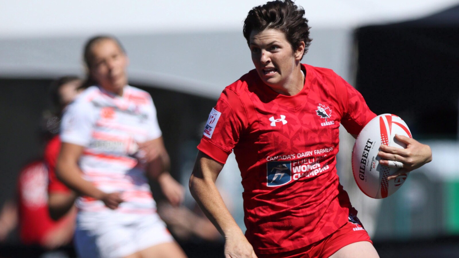 Brittany Benn en pleine course contre l'équipe de l'Angleterre.