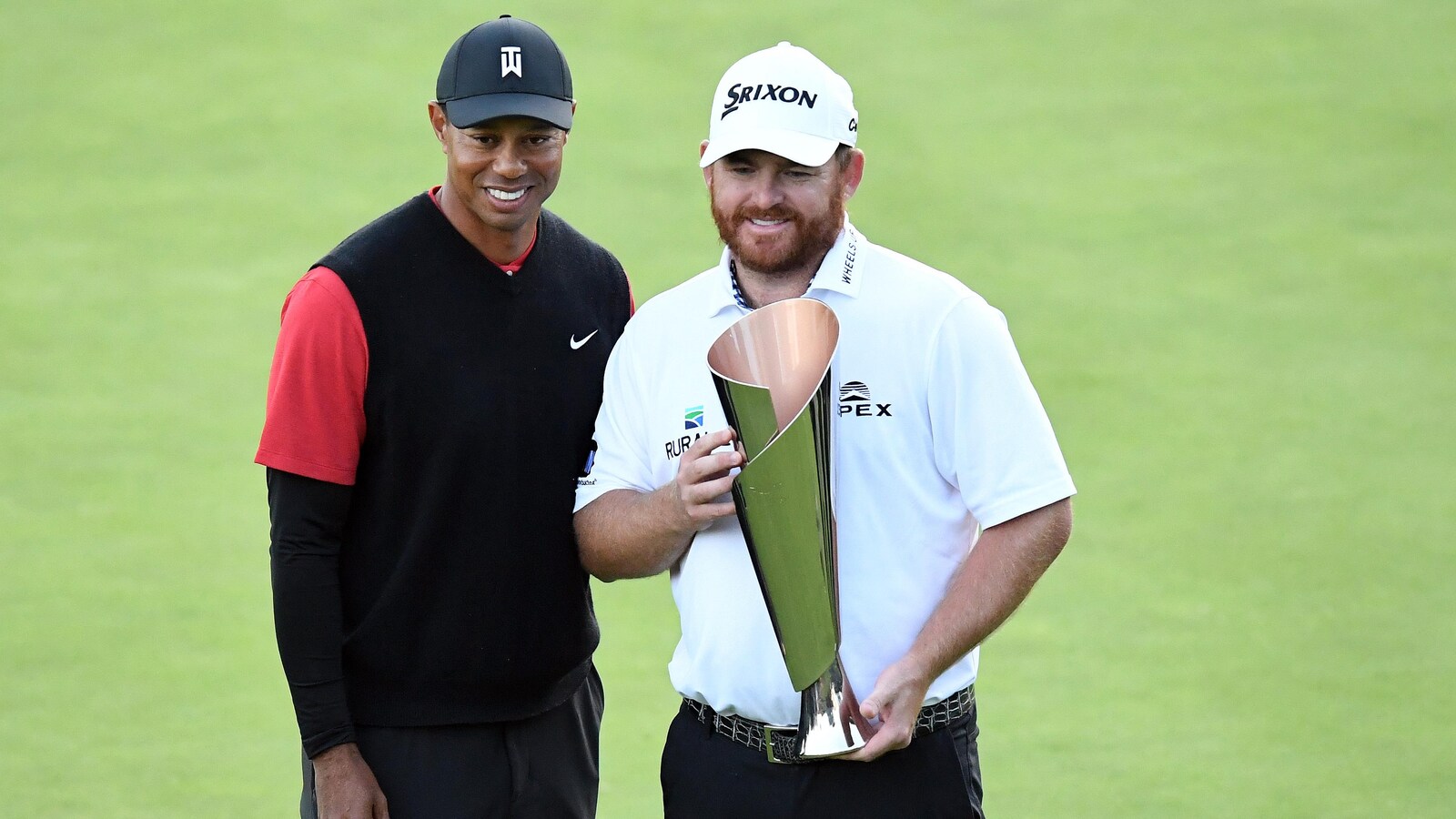 Tiger Woods et J.B. Holmes