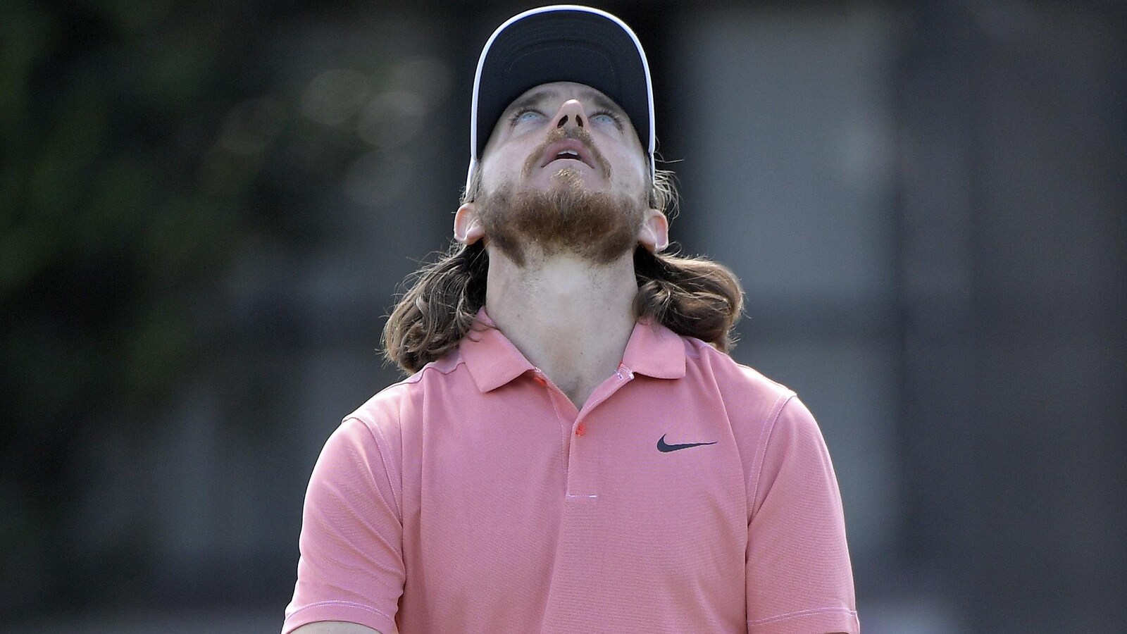 Tommy Fleetwood réagit après avoir raté un coup roulé
