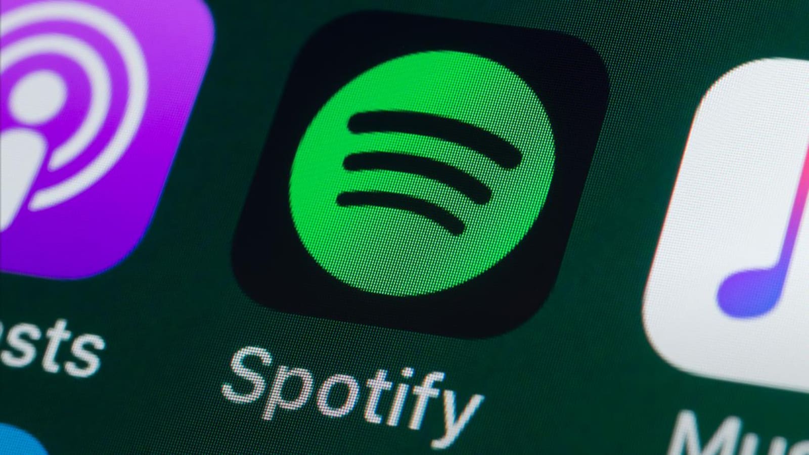 L'icône de l'application Spotify, sur un écran de téléphone