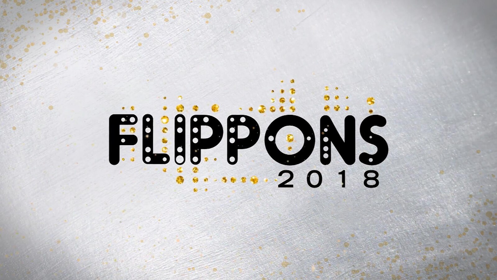 Un logo en lettre noir sur un fond gris avec des gouttes dorées