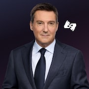 Patrice Roy et l'ic&ocirc;ne illustrant l'interpr&eacute;tation en langue des signes.