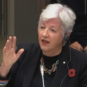 Annette Verschuren en comité.