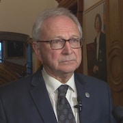 Le premier ministre du Nouveau-Brunswick, Blaine Higgs, à l'Assemblée législative le 21 mars 2024.