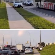 Une voiture sur une bande gazonnée ou sur le trottoir avec une route congestionnée à côté.
