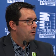 Christian Daigle lors d'une conférence de presse.