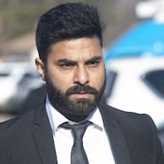 Le chauffeur de camion Jaskirat Singh Sidhu entre au centre Kerry Vickar pour sa sentence à Melfort, en Saskatchewan, le 22 mars 2019. 