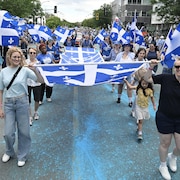 Des participants au défilé de la Saint-Jean.