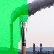 Un pinceau colore en vert une image de fumée d'usine.